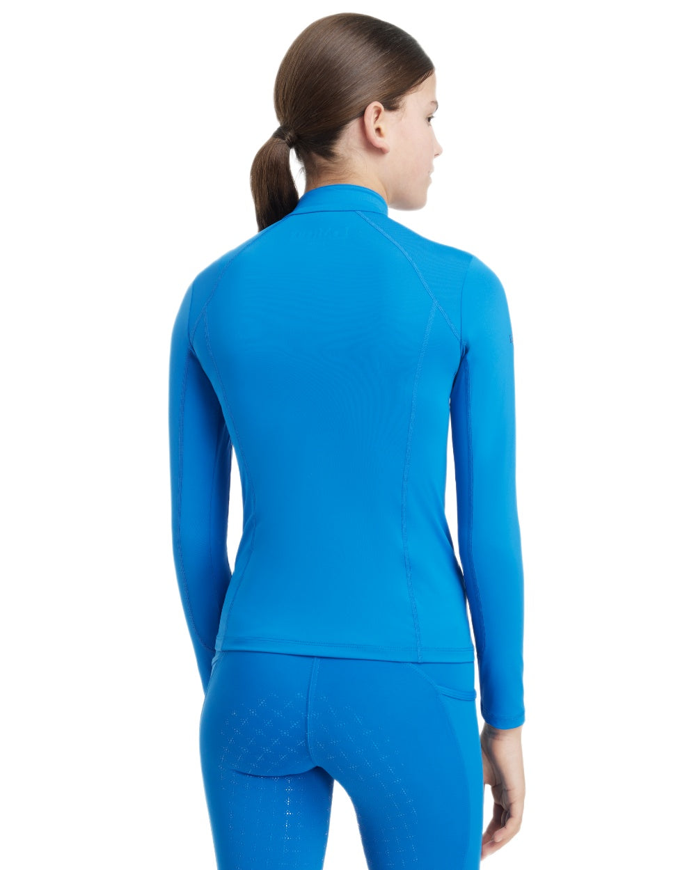 Benetton Blue coloured LeMieux Young Rider Classique Base Layer on white background 