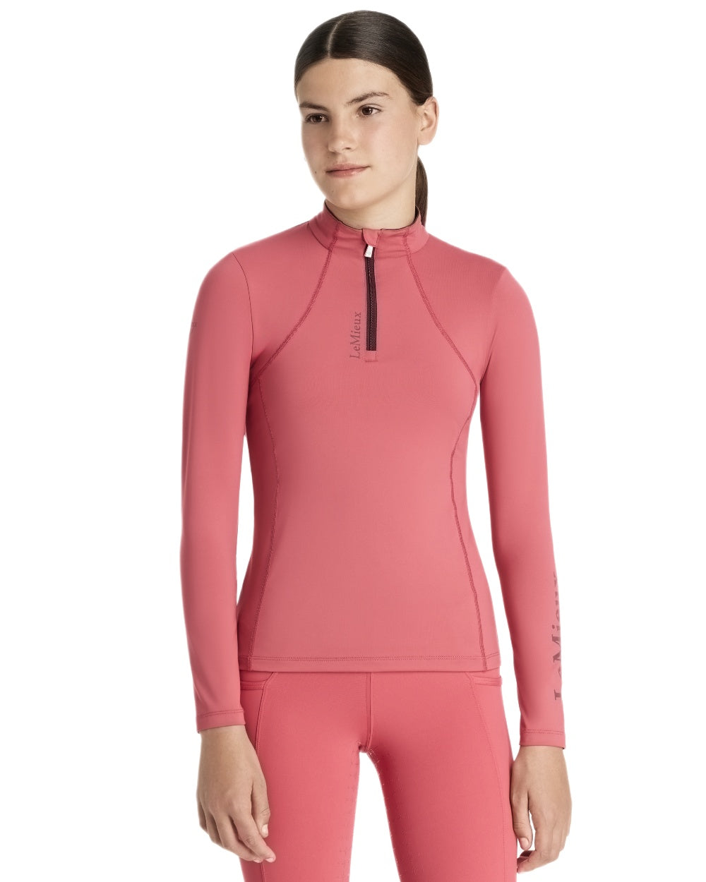 Cranberry coloured LeMieux Young Rider Classique Base Layer on white background 