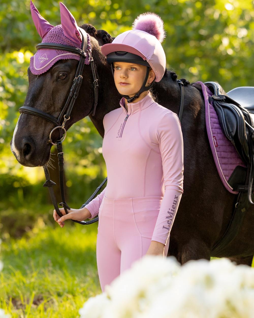 Fondant coloured LeMieux Young Rider Classique Base Layer on tree background 