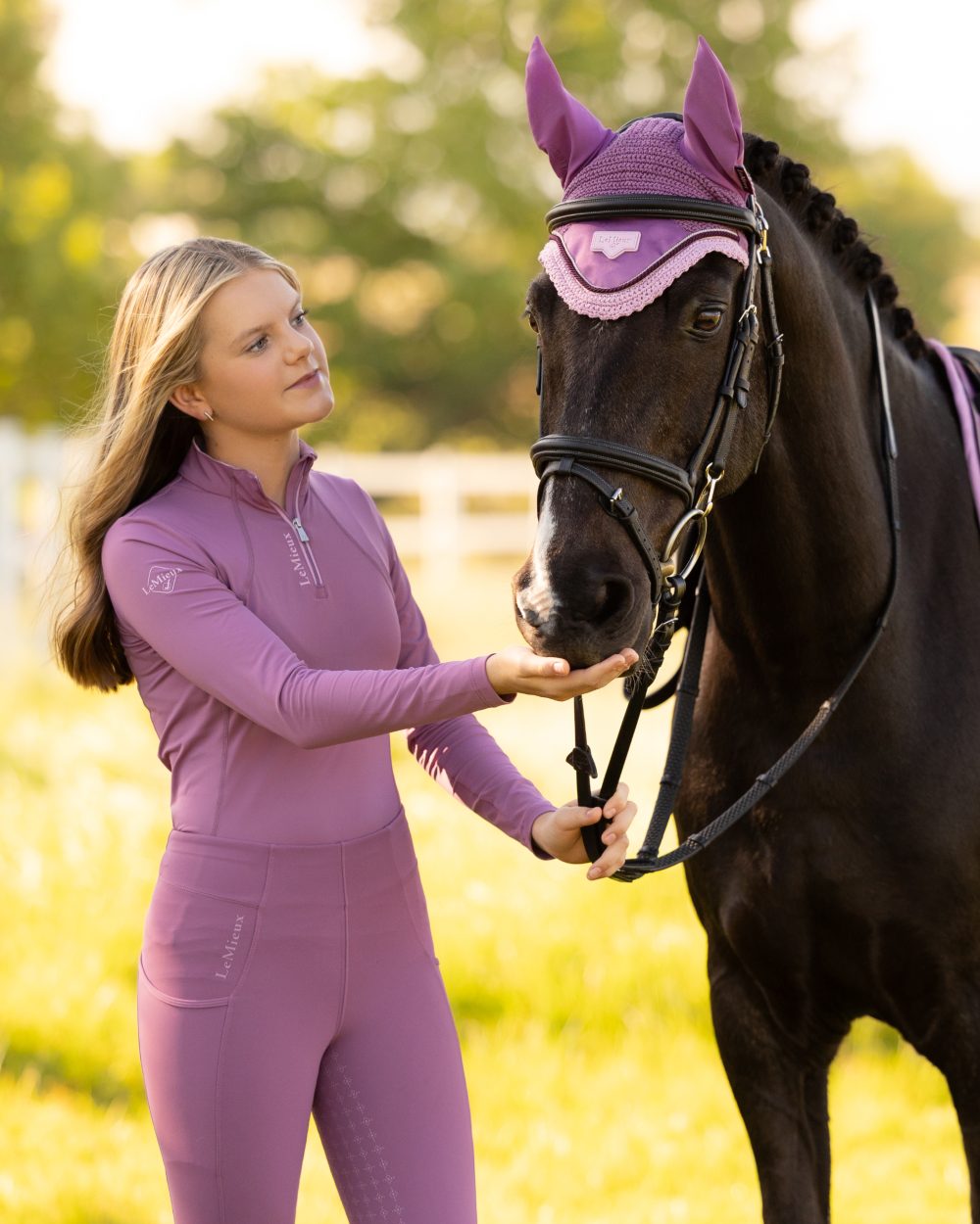 Mallow coloured LeMieux Young Rider Classique Base Layer on tree background 