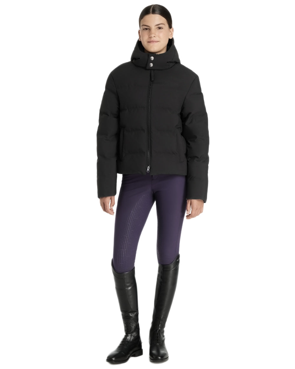 Black coloured LeMieux Young Rider Daisy Waterproof Coat on white background 