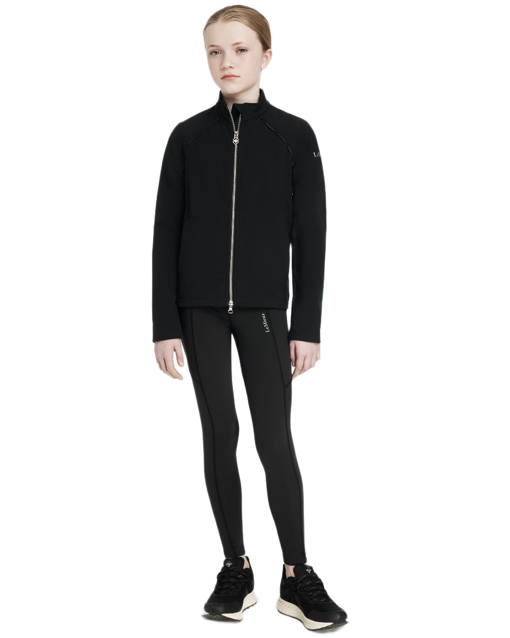 Black coloured LeMieux Young Rider Elite Softshell Jacket on white background 