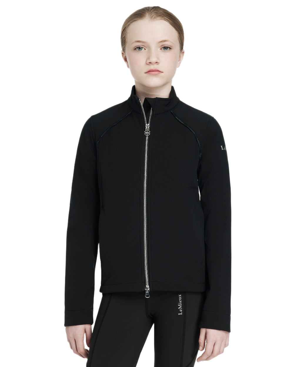 Black coloured LeMieux Young Rider Elite Softshell Jacket on white background 