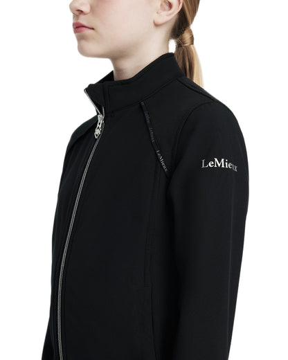 Black coloured LeMieux Young Rider Elite Softshell Jacket on white background 