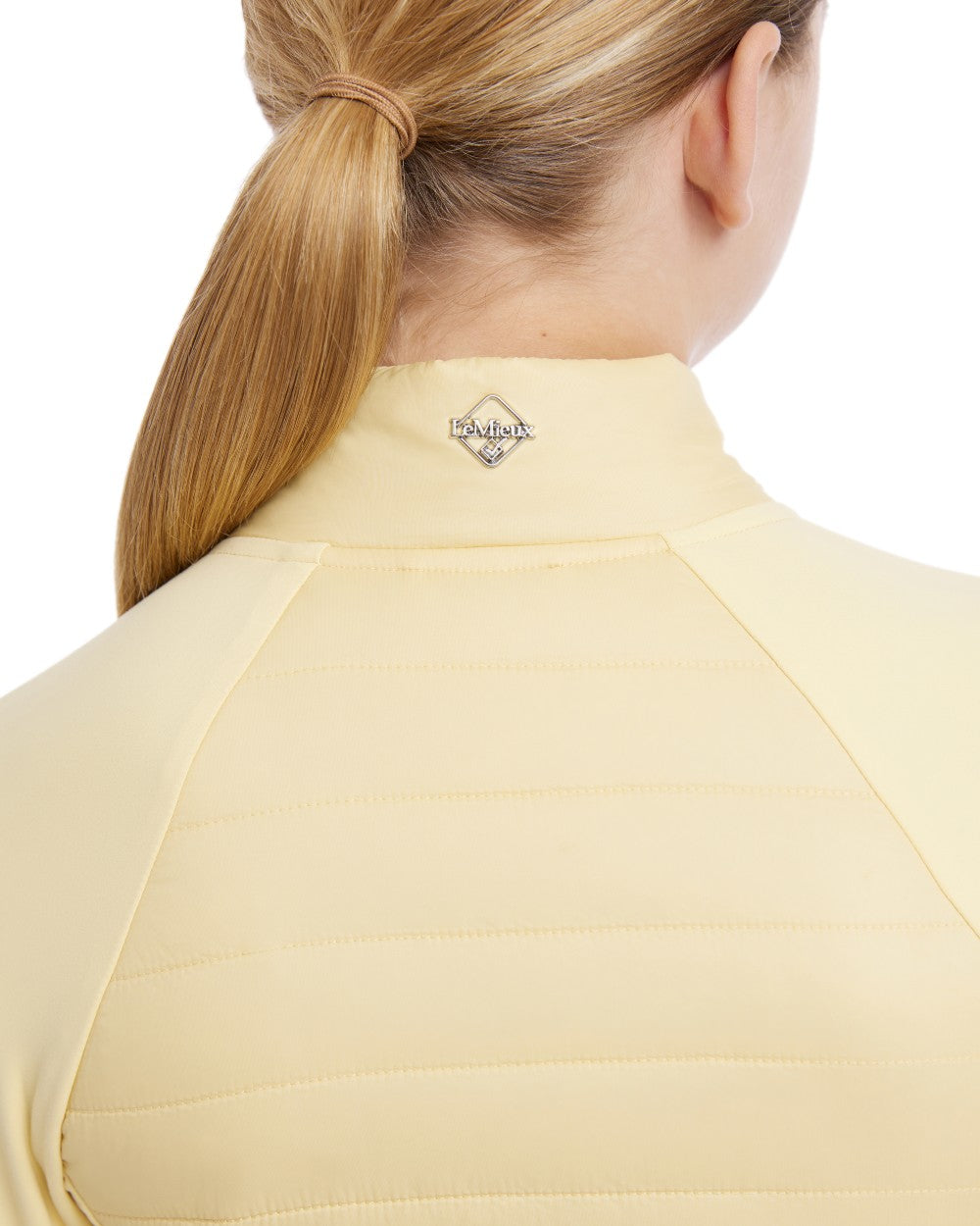 Mimosa coloured LeMieux Young Rider Josephine Jacket on white background 
