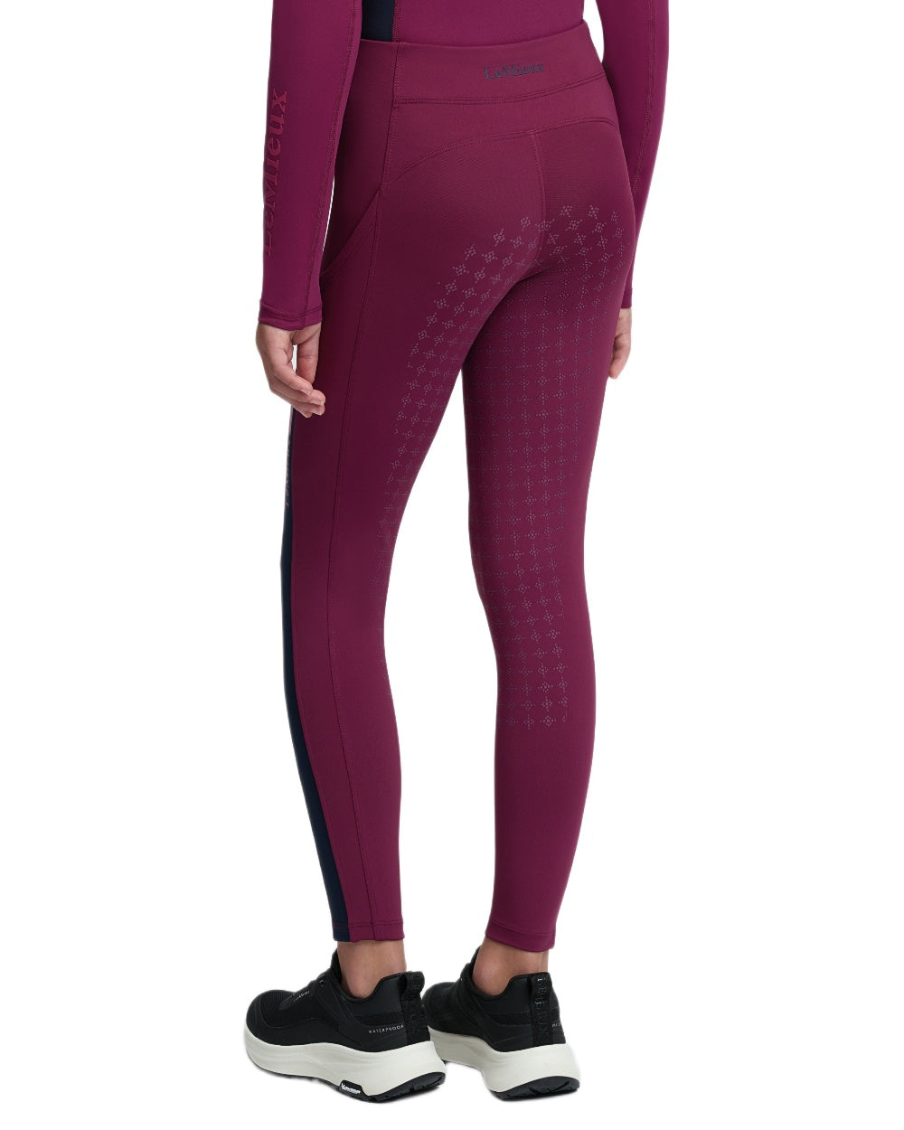 Blackberry coloured LeMieux Young Rider Orla Pull Ons on white background 