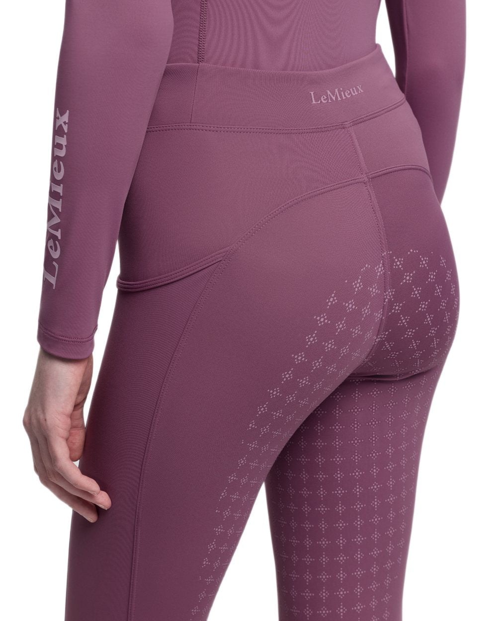 Mallow coloured LeMieux Young Rider Orla Pull Ons on white background 