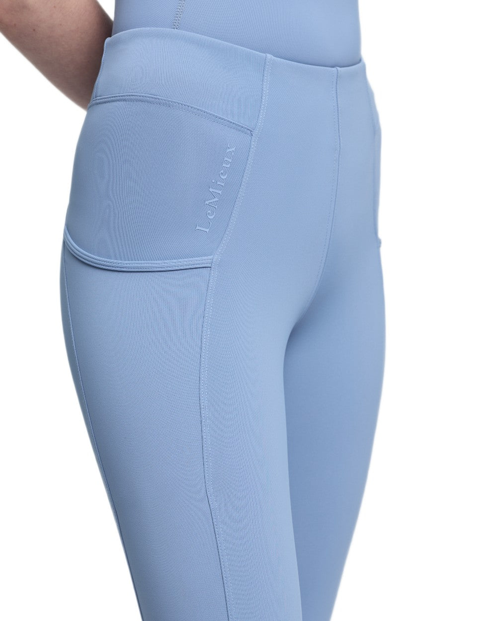 Powder Blue coloured LeMieux Young Rider Orla Pull Ons on white background 