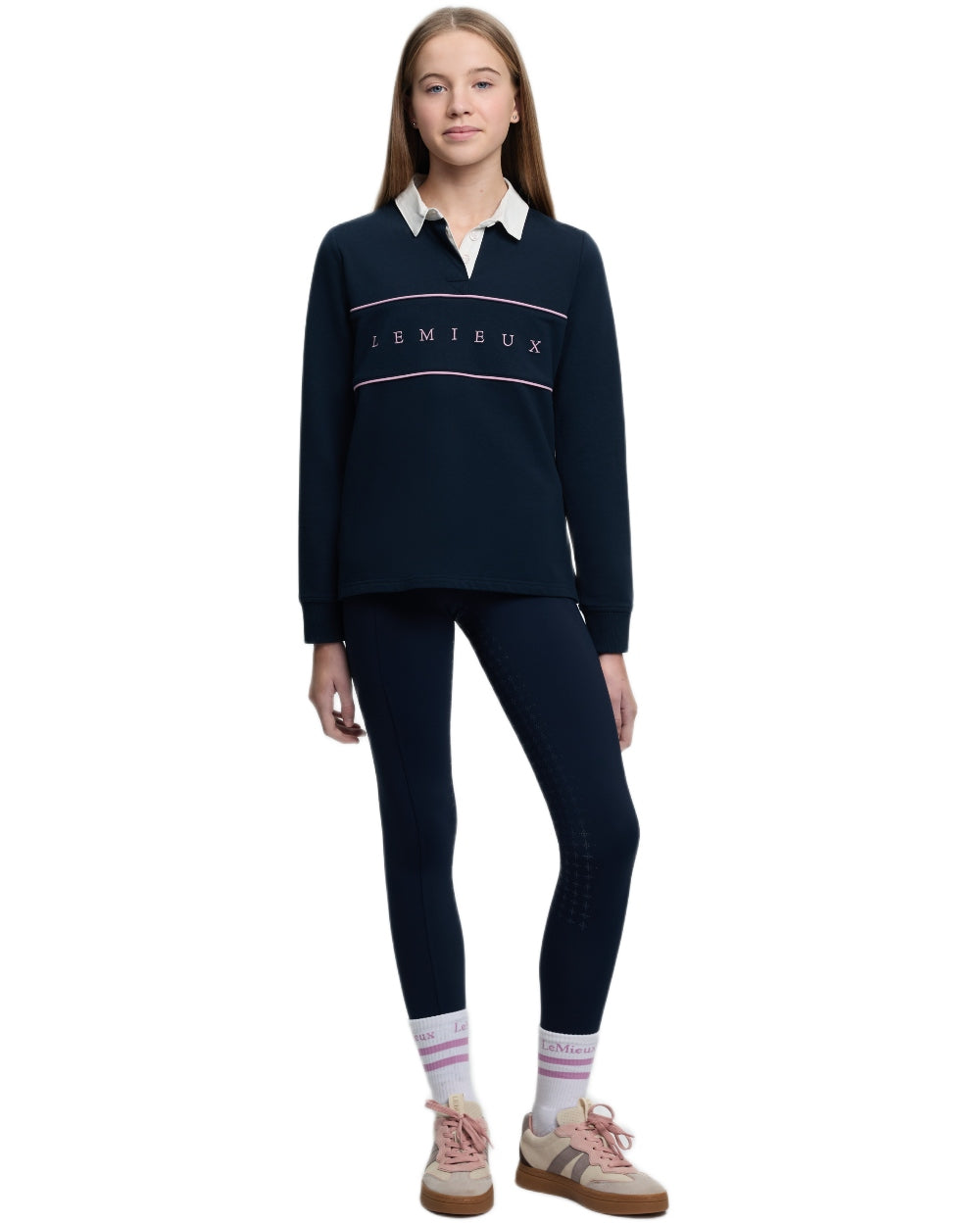 Navy coloured LeMieux Young Rider Riley Rugby Shirt on white background 