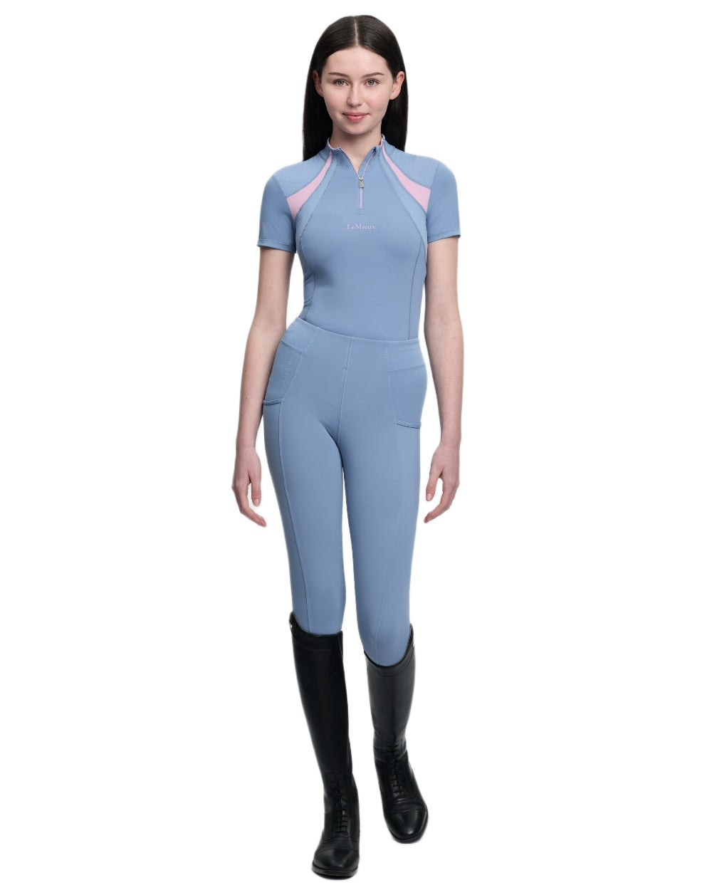 Powder Blue coloured LeMieux Young Rider Short Sleeve Mia Mesh Base Layer on white background 