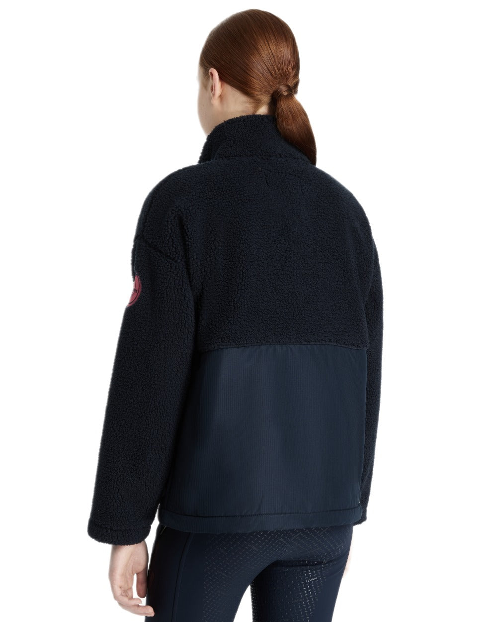 Navy coloured LeMieux Young Rider Tammy Teddy Fleece on white background 