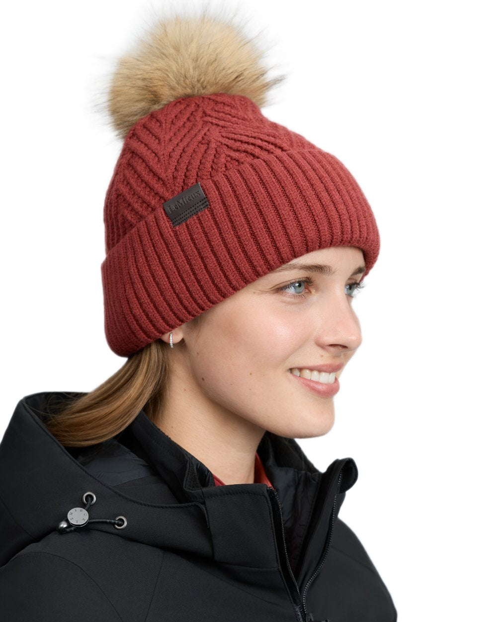 Russet coloured LeMieux Clara Knit Beanie on white background 