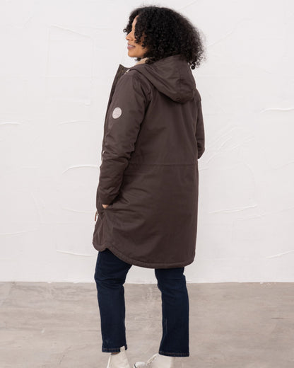 Cocoa coloured Lighthouse Isobel Ladies Coat on wall background 