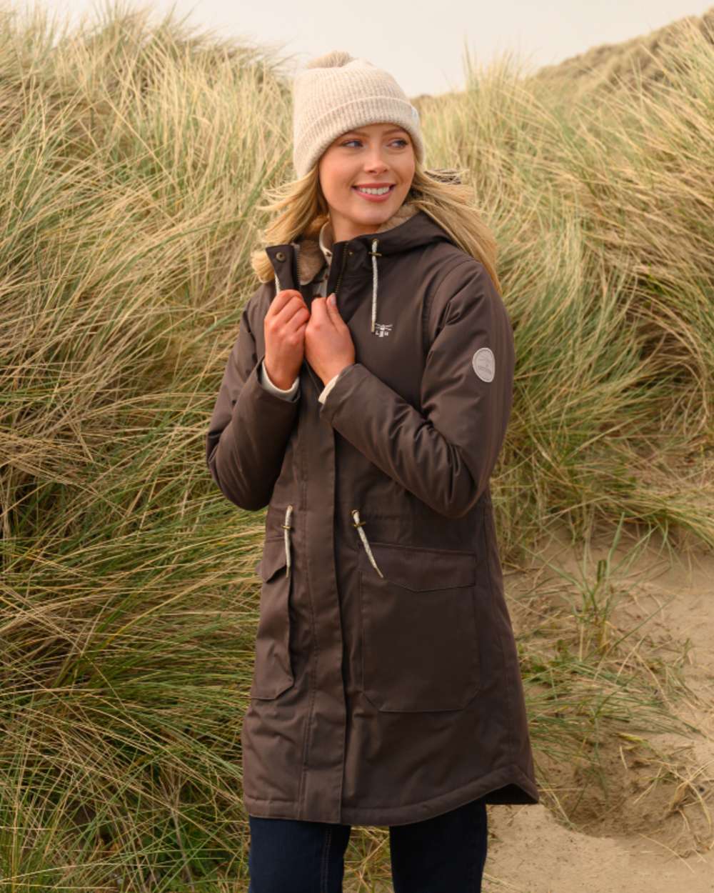Cocoa coloured Lighthouse Isobel Ladies Coat on grass background 