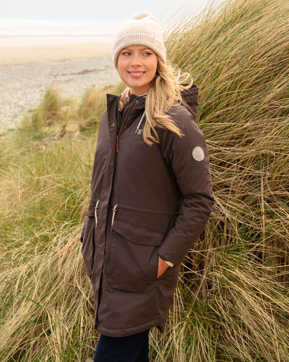 Cocoa coloured Lighthouse Isobel Ladies Coat on grass background 