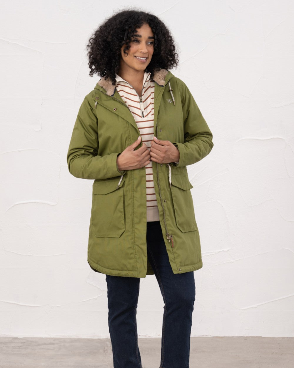 Sea Kelp coloured Lighthouse Isobel Ladies Coat on wall background 