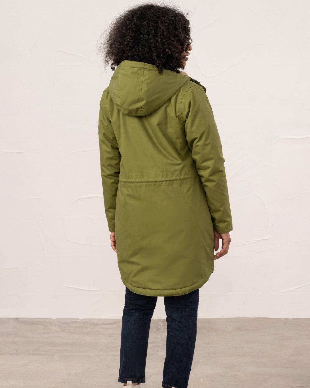 Sea Kelp coloured Lighthouse Isobel Ladies Coat on wall background 