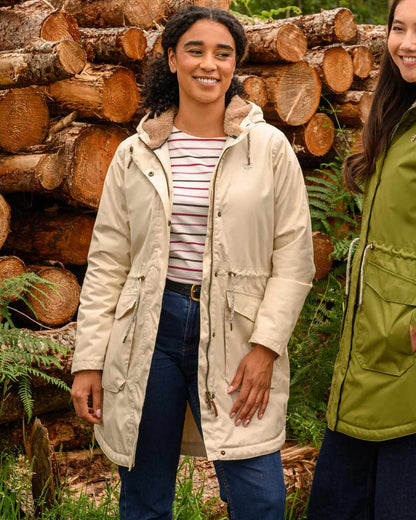 Irish Cream coloured Lighthouse Isobel Ladies Coat on wood background 