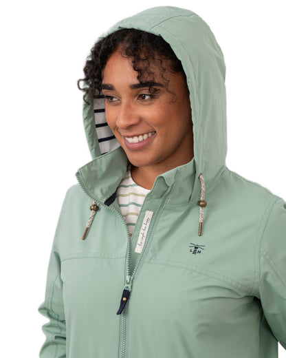 Basil coloured Lighthouse Ladies Beachcomber II Coat on white background 