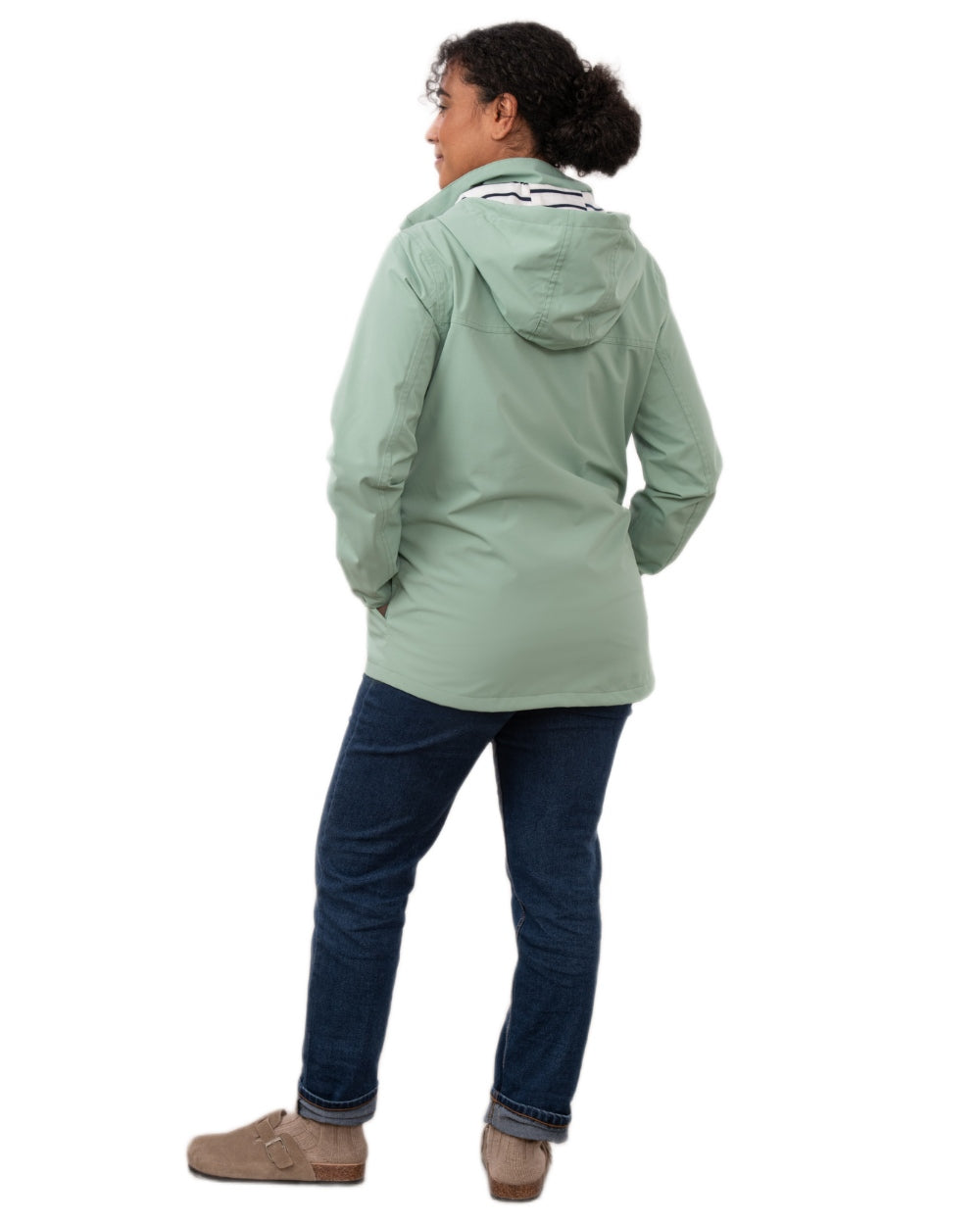 Basil coloured Lighthouse Ladies Beachcomber II Coat on white background 