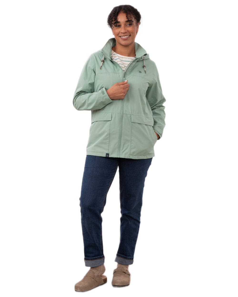 Basil coloured Lighthouse Ladies Beachcomber II Coat on white background 