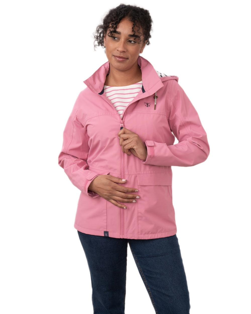 Pink coloured Lighthouse Ladies Beachcomber II Coat on white background 
