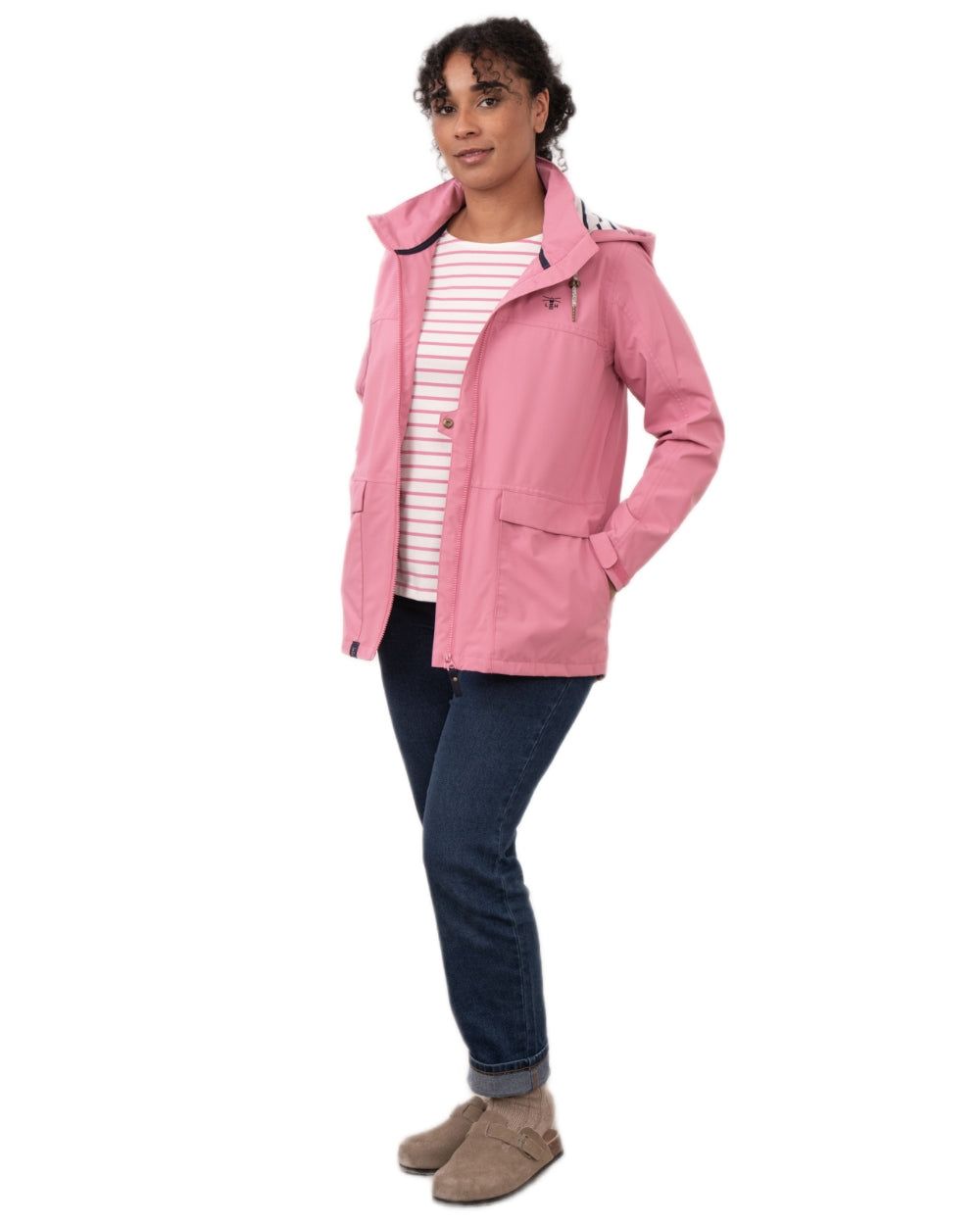 Pink coloured Lighthouse Ladies Beachcomber II Coat on white background 