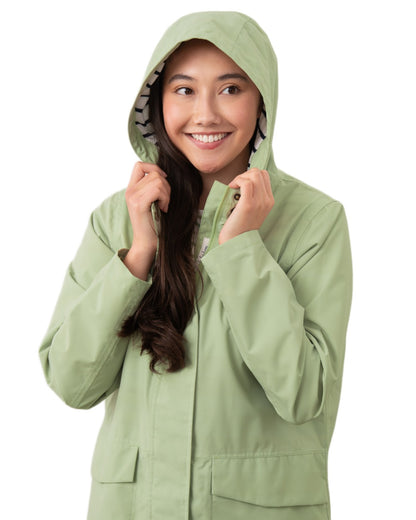 Pistachio coloured Lighthouse Ladies Beachcomber Long Jacket II on white background 