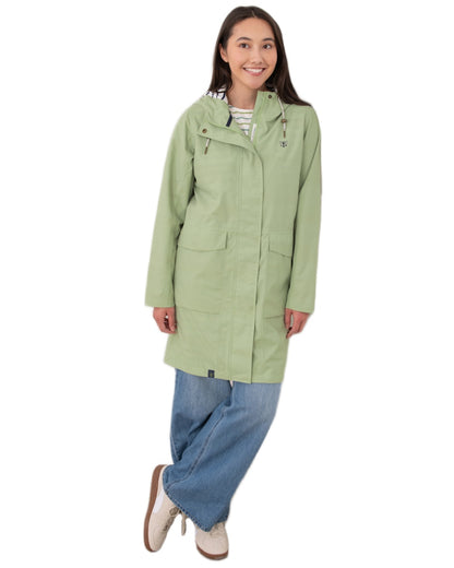 Pistachio coloured Lighthouse Ladies Beachcomber Long Jacket II on white background 