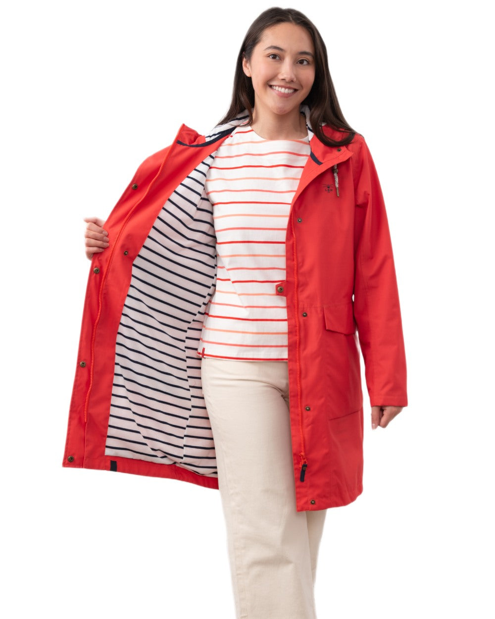 Poppy coloured Lighthouse Ladies Beachcomber Long Jacket II on white background 