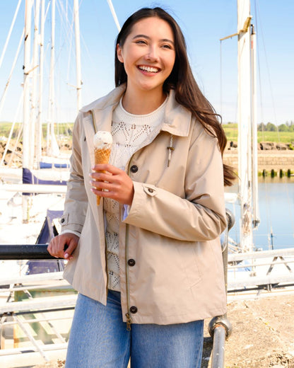 Clay coloured Lighthouse Ladies Blair Coat on outdoor background 