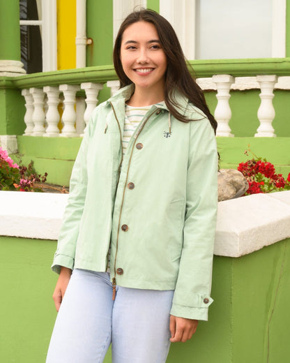 Mint coloured Lighthouse Ladies Blair Coat on outdoor background 