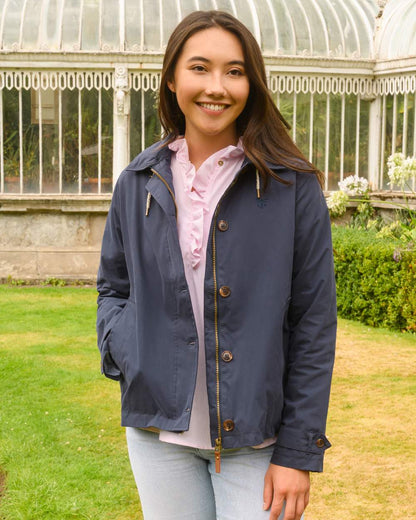 Navy coloured Lighthouse Ladies Blair Coat on outdoor background 