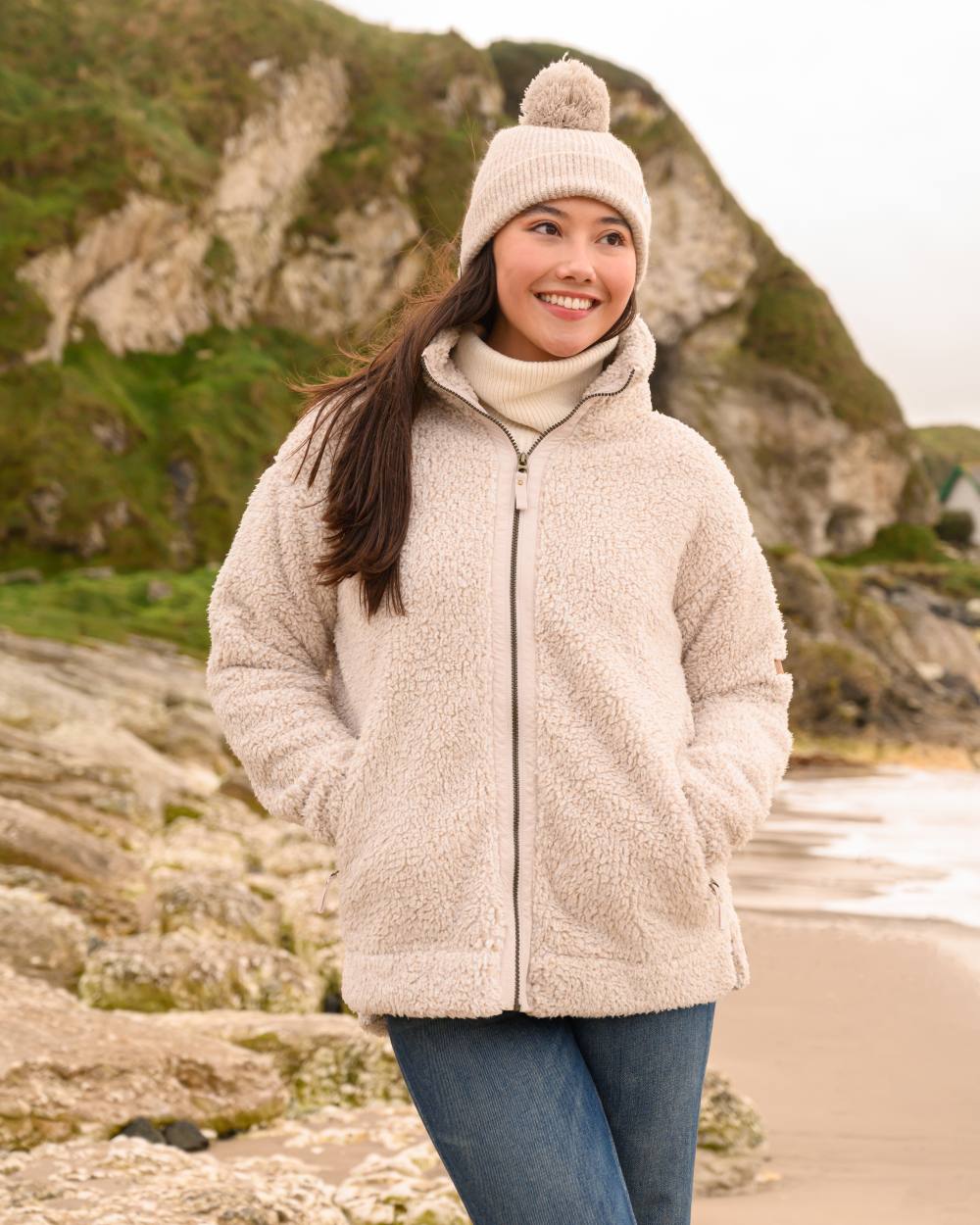 Irish Cream coloured Lighthouse Ladies Cobh Full Zip Fleece Jacket on  sea background 