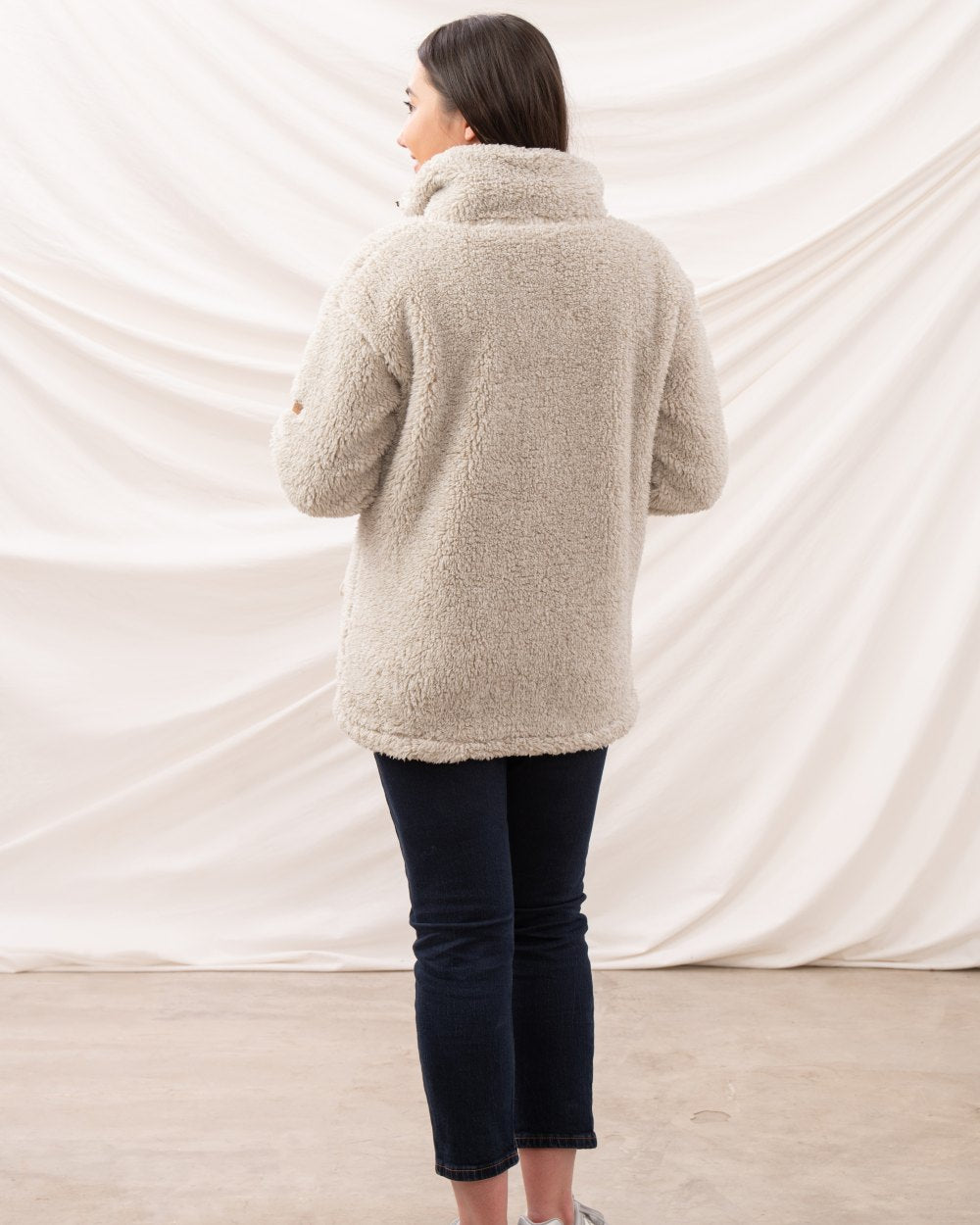 Irish Cream coloured Lighthouse Ladies Cobh Full Zip Fleece Jacket on curtain background 