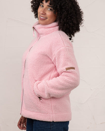 Pink coloured Lighthouse Ladies Cobh Full Zip Fleece Jacket on wall background 