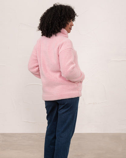 Pink coloured Lighthouse Ladies Cobh Full Zip Fleece Jacket on wall background 