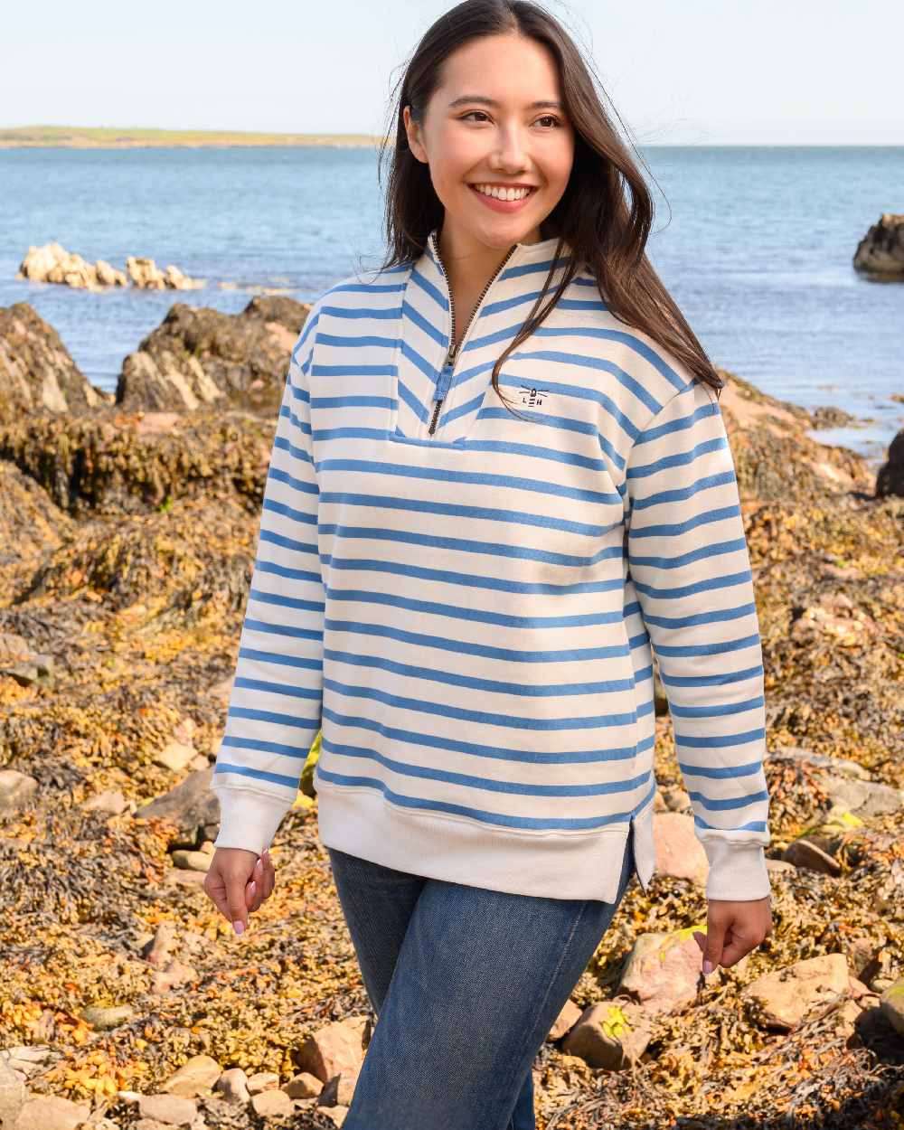 Marine Blue Stripe coloured Lighthouse Ladies Coral Jersey on coastal background 