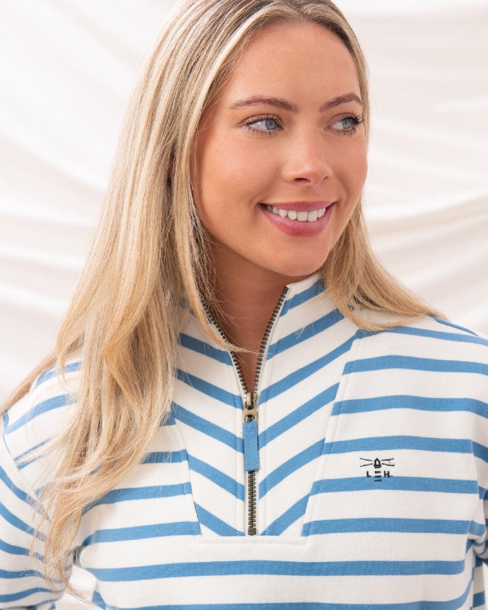 Marine Blue Stripe coloured Lighthouse Ladies Coral Jersey on curtain background 