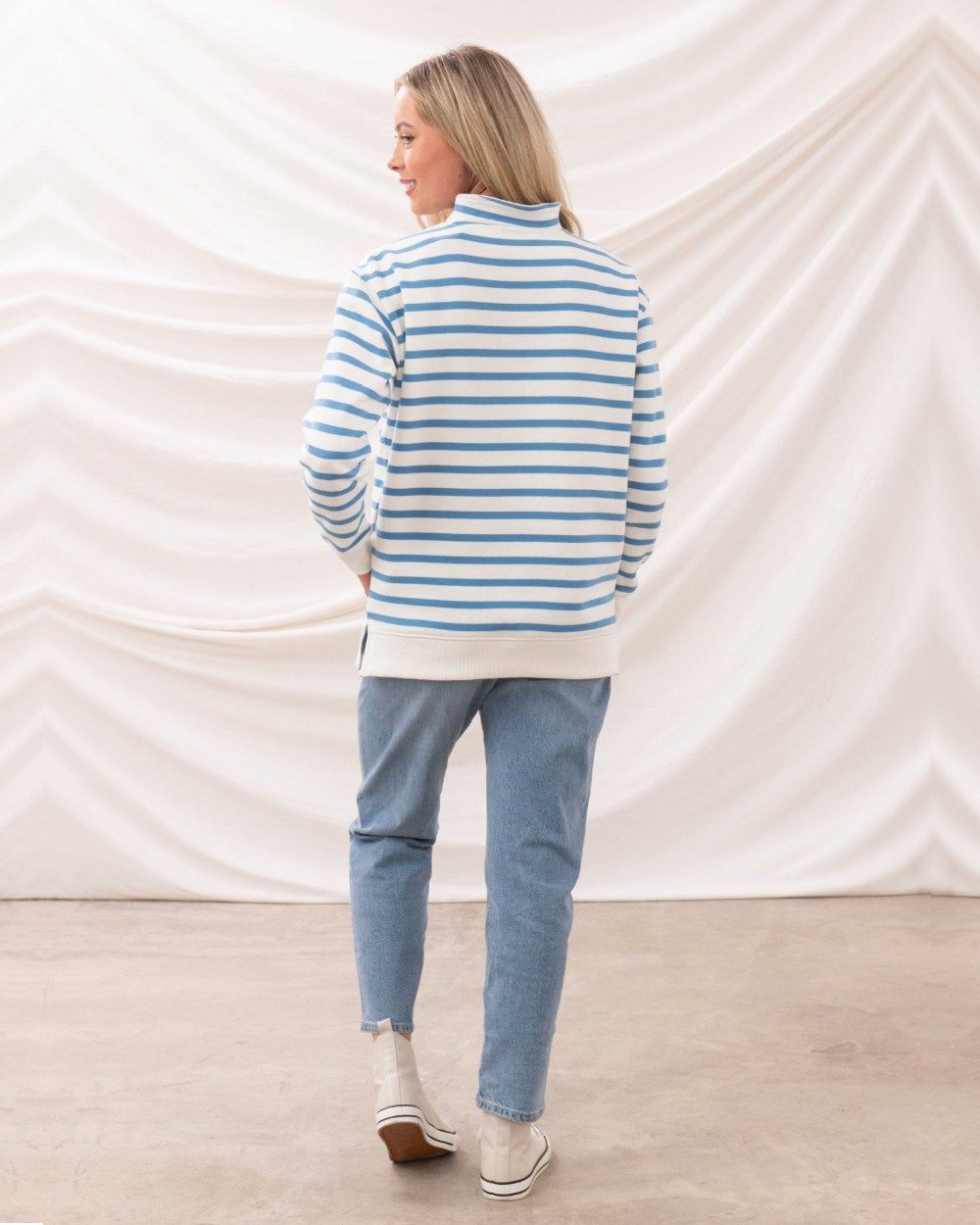 Marine Blue Stripe coloured Lighthouse Ladies Coral Jersey on curtain background 