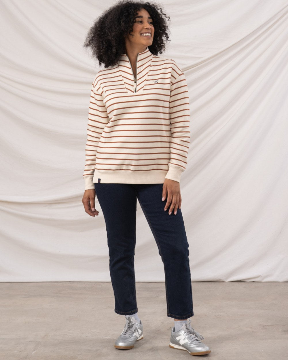 Rust Stripe coloured Lighthouse Ladies Coral Jersey on curtain background 
