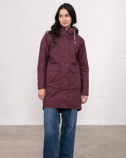 Damson coloured Lighthouse Ladies Fallon Coat on wall background 