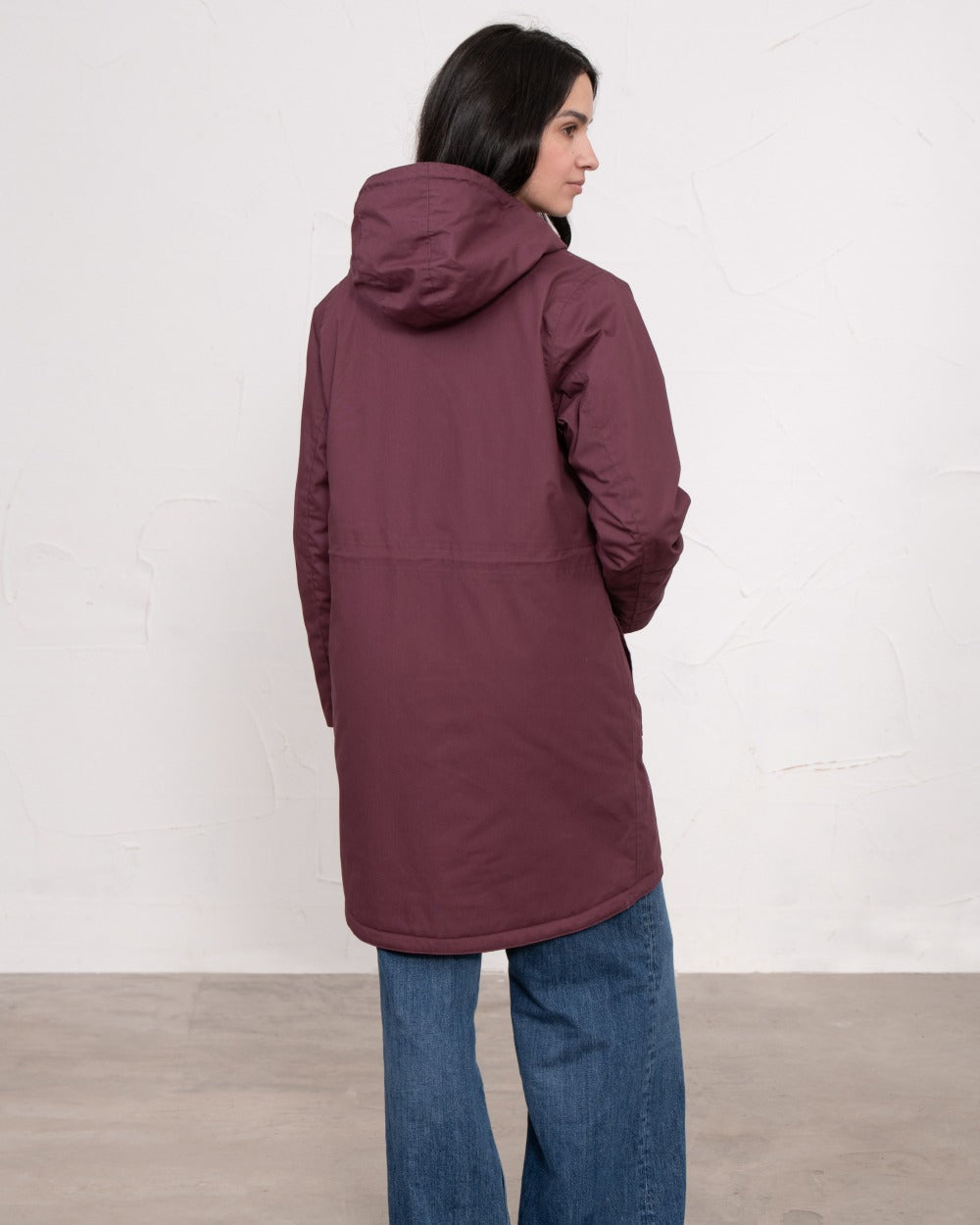 Damson coloured Lighthouse Ladies Fallon Coat on wall background 