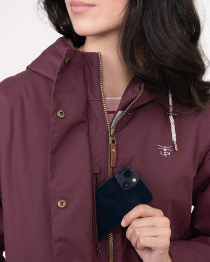 Damson coloured Lighthouse Ladies Fallon Coat on wall background 