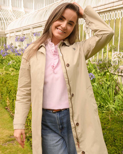 Clay coloured Lighthouse Ladies Hallie Long Coat on garden background 