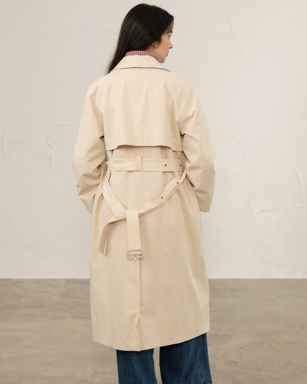Stone coloured Lighthouse Ladies Harper Waterproof Trench Coat on wall background 