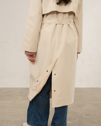 Stone coloured Lighthouse Ladies Harper Waterproof Trench Coat on wall background 