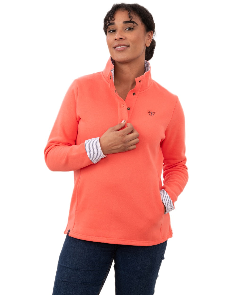 Coral coloured Lighthouse Ladies Haven II Jersey on white background 