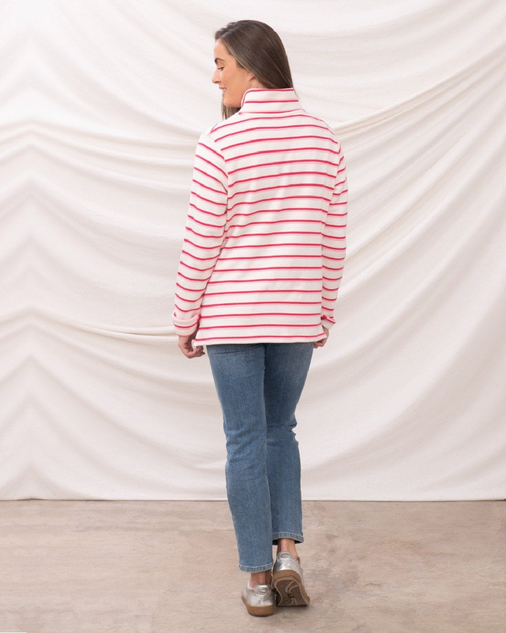 Pink Stripe coloured Lighthouse Ladies Haven Jersey on curtain background 