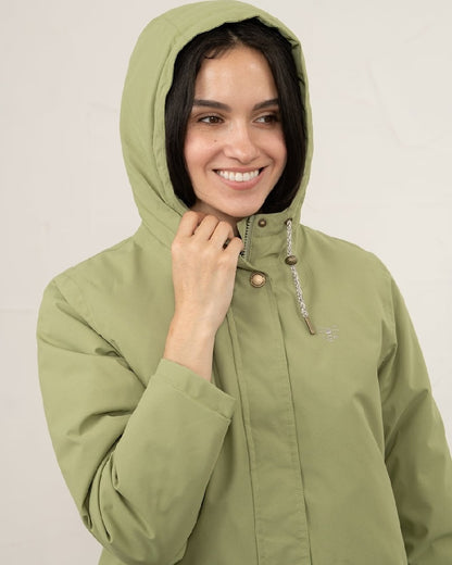 Moss coloured Lighthouse Ladies Imogen Coat on studio background 